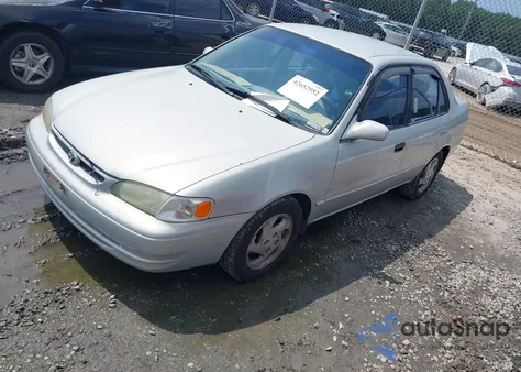 2000 Toyota Corolla Le from USA, damaged, VIN 2T1BR18E0YC357216